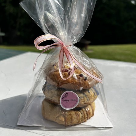 A bag of assorted cookies tied with a ribbon.